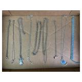 Silver tone necklaces and bracelets