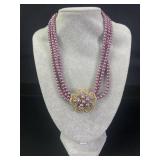 Three strand purple bead floral necklace