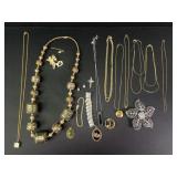 Gold tone necklaces, bracelets, and more