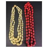 Red lucite necklace & multi strand yellow stone