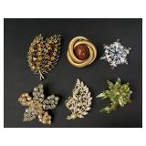 Coro, Scaasi, and more floral brooches
