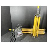 Water pump and yellow Tripods