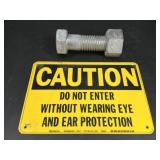Bolt and caution sign