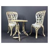 Cast iron doll table and chairs