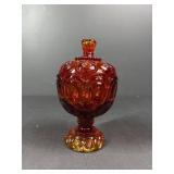 Red and yellow carnival glass candy dish