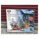 2 Pack Holograpgic Santa in Sleigh Sculpture