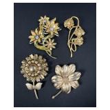 Floral brooches