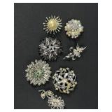 Floral brooches