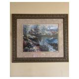 Framed print and wall sconces