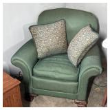 Green Upholstered Accent Chair with Pillows