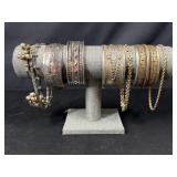Silver and gold tone bracelets