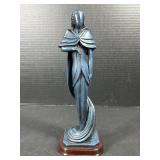 Blue Lady Figurine on Wood Base
