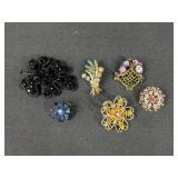 Floral rhinestone brooches