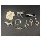 Silver tone brooches