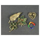 Four leaf clover brooch and more