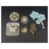 Floral brooches
