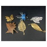 Leaf brooches