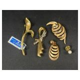 Gold tone brooches