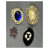 Four Brooches