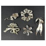 Floral brooches