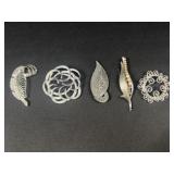 Silver tone brooches