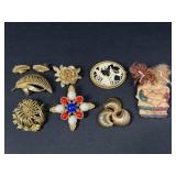 Gold tone brooches