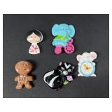 Plastic Avon brooches