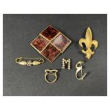 Gold tone brooches