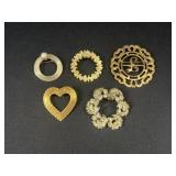Gold tone brooches