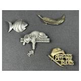 Four Brooches