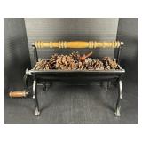 Vintage Cast Iron Newspaper Log Roller