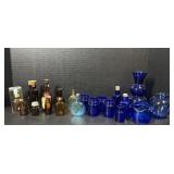 Blue and brown glass bottles and jars