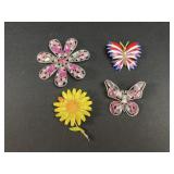 Flower and butterfly brooches