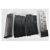 A Group of Four Assorted Firearm Magazines, includ