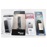 A Group of Four New Pistol Magazines by CZ, Sig Sa