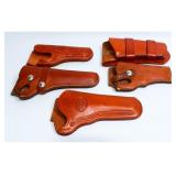 A Group of Five Western-Style Leather Gun Holsters