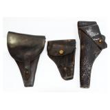Three Early 20th Century Military Leather Pistol