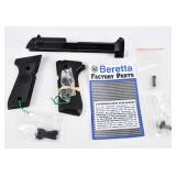 A Collection of Beretta M9 9mm Factory Pistol