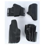 A Collection of 4 Polymer Handgun...