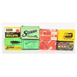 A Collection of 8 Boxes of 30 Caliber Projectile