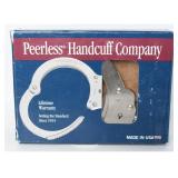 A Pair of Peerless Handcuff Company 702C-6X Chain