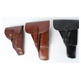 A Trio of German Style Leather Pistol Holsters
