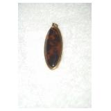 Gold Tone Pendant w/color stone inside