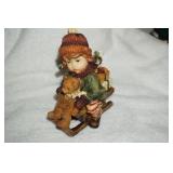 Little Girl on Sled Figurine