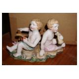 2 Children Sitting together Figurine