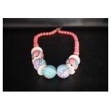 Necklace w/designs pink & blue