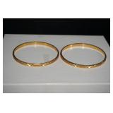 Two Gold Tone Bangle Bracelets