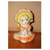 Little Girl Figurine in an Orange Dress