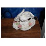 Hands Holding an Angel Figurine