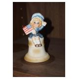 74 Lady Holding a Flag w/a bell Figurine